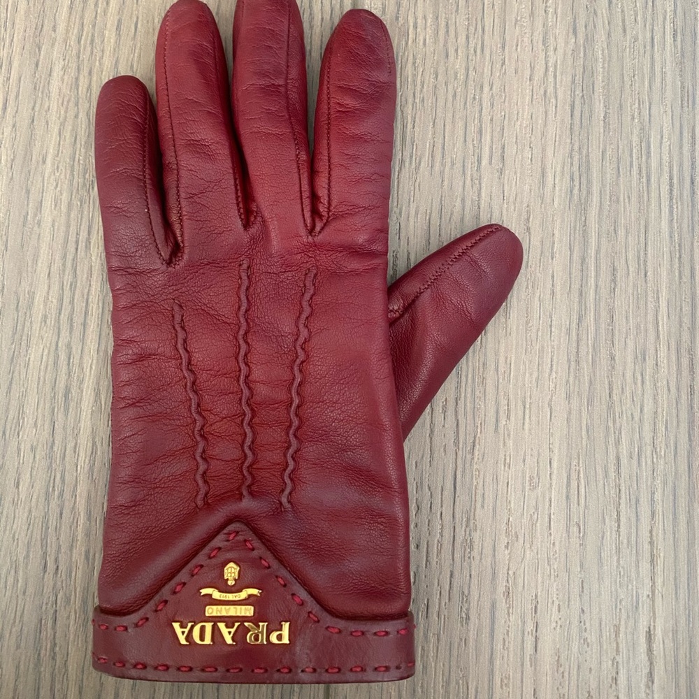 Single red leather Prada glove